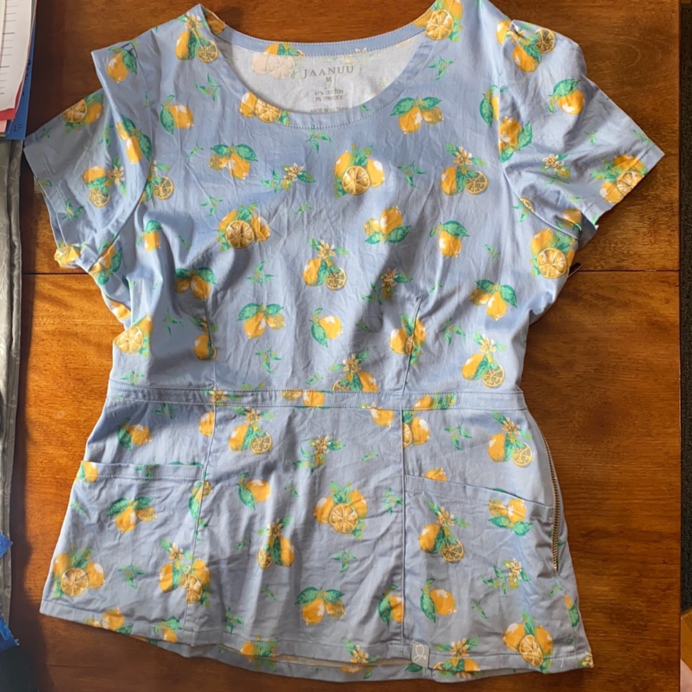 Jaanuu peplum top limonada size medium